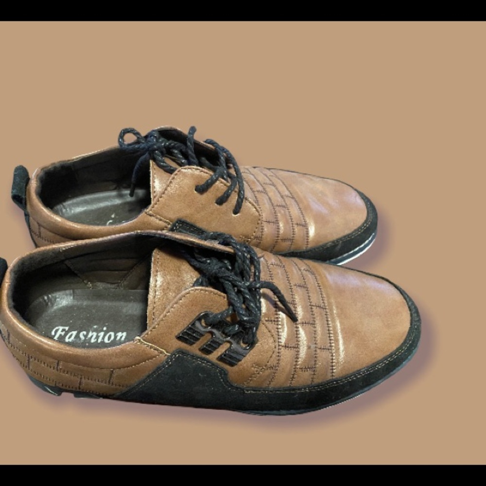 Size 11-brown-tie-up sneakers.